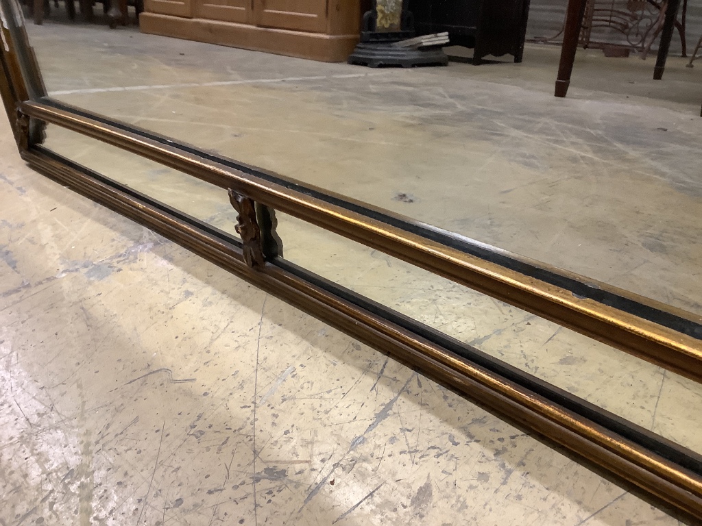A Georgian style gilt-framed rectangular wall mirror with marginal plates, width 105cm, height 70cm